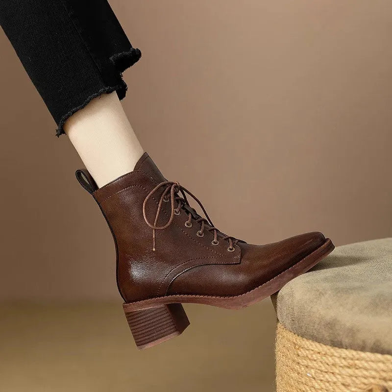 Women's black pointed toe short tube boots with 5.5cm block heel and ankle shaft height