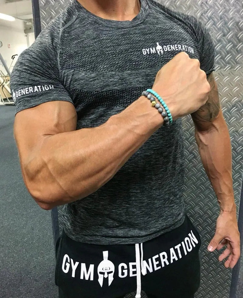 Men's short sleeve polyester workout top in blue, size M to 3XL, for gym training
