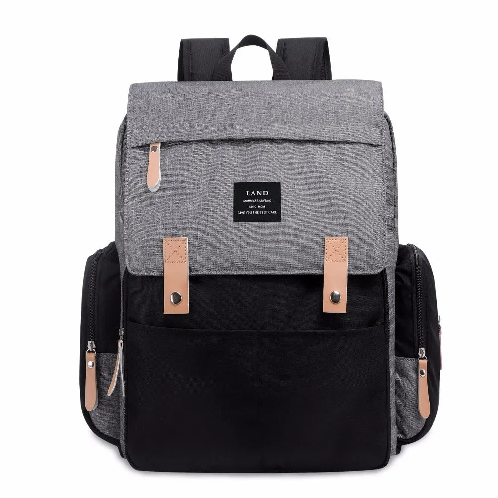 Large Oxford cloth diaper backpack with changing mat in beige colour, dimensions 33x39x15cm