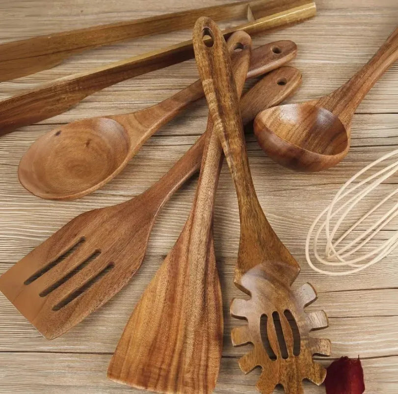 7-piece wooden cooking utensil set showing spoons and spatulas with non-slip handles