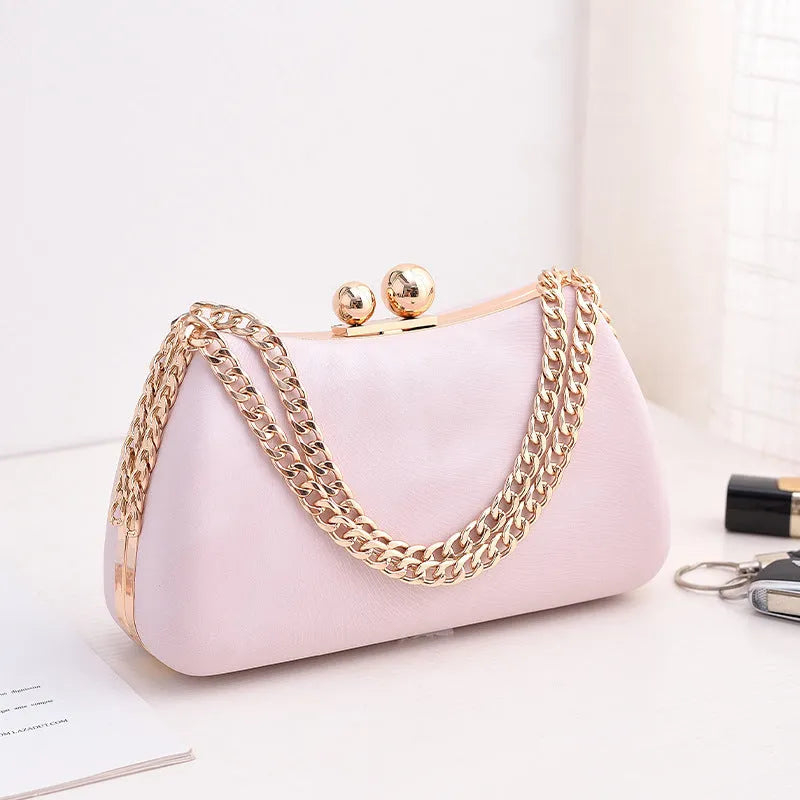 Embossed PU leather pillow chain shoulder bag in silver with lock closure