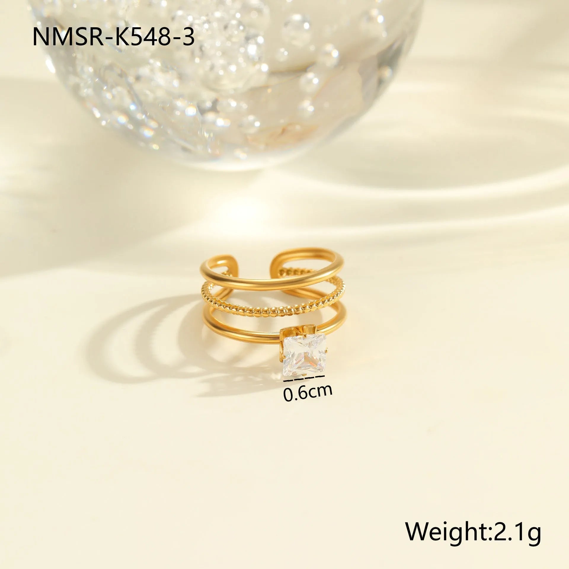 Gold electroplated stainless steel ring with zircon stones and open mouth adjustable design