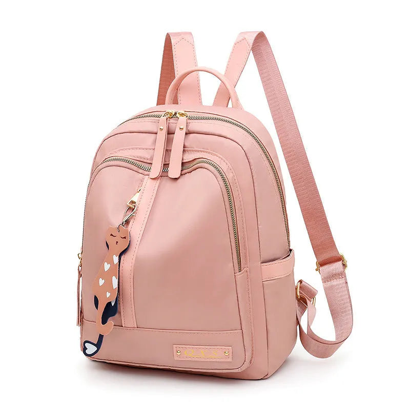 Black and pink casual nylon backpack with double straps, soft handle, and square vertical shape
