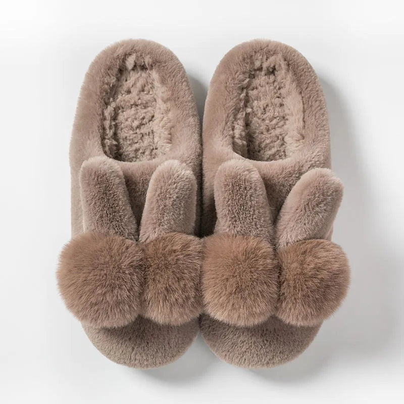 Women's fluffy rabbit fur slippers in pink with a high upper and sewn sole