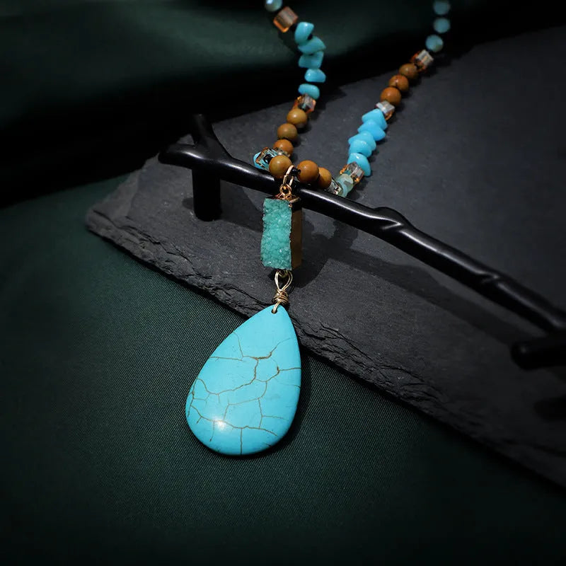 Blue turquoise heart-shaped drop pendant necklace on a long ball bead chain