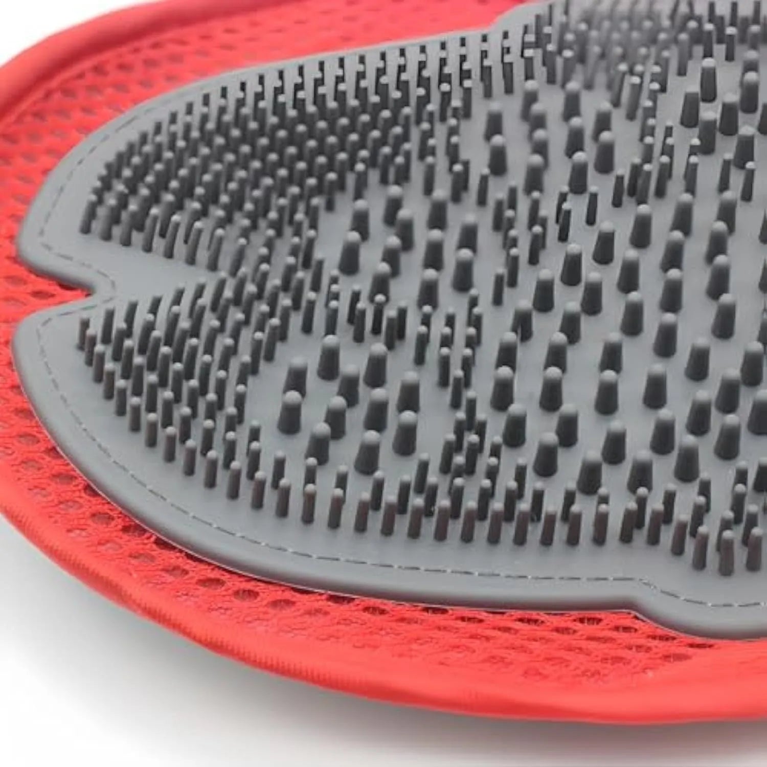 Red pet bathing glove with integrated brush for grooming and hair removal during bathing