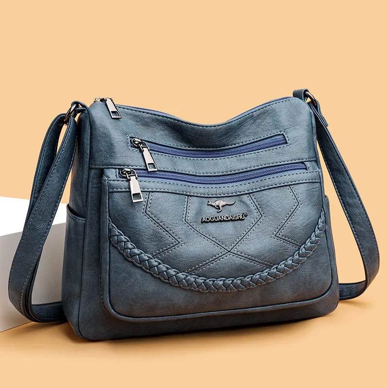 Soft PU leather crossbody shoulder bag in horizontal square shape with crossbody strap