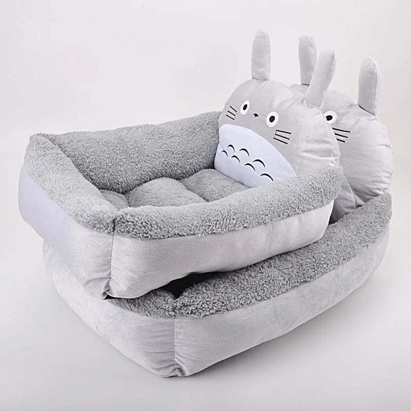 A cartoon-style washable pet bed sofa for small dogs and cats, shown in a blue colour.