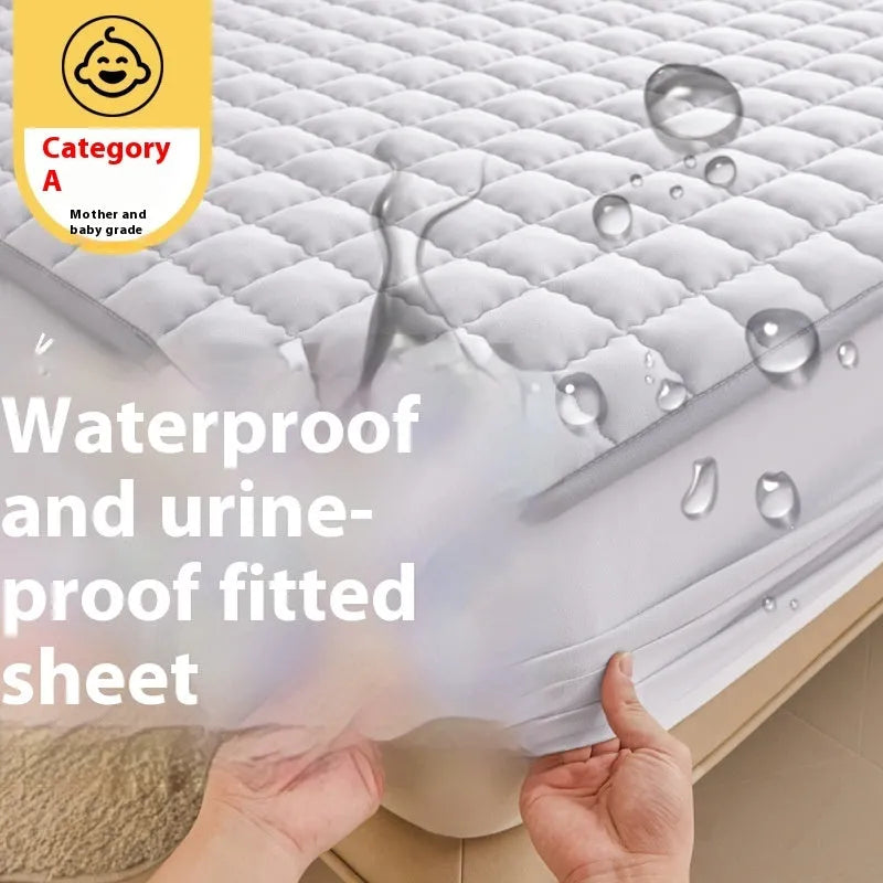 A washed cotton waterproof fitted sheet in a neutral colour, shown fitted neatly on a mattress corner.
