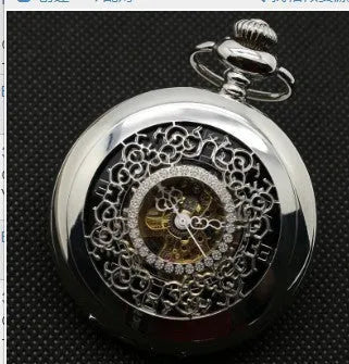 Retro floral print automatic mechanical pocket watch with transparent case back in gold finish.