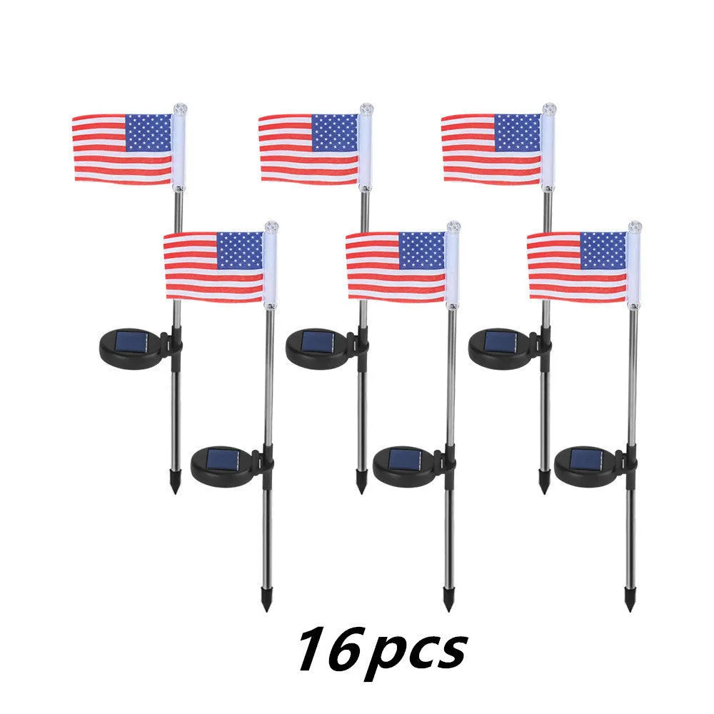 Solar garden flag light with stainless steel pole showing American flag design illuminated at night