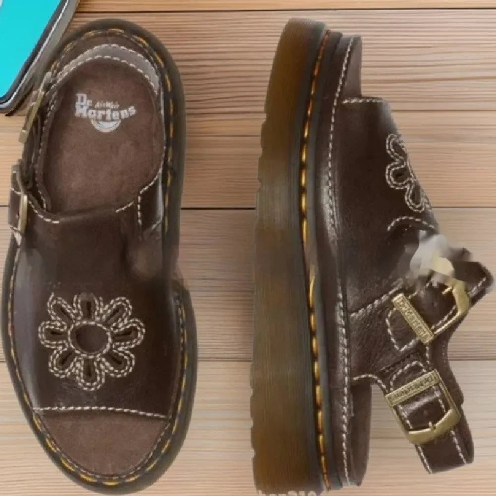Men's black embroidered floral beach sandals with flat heel, showing PU upper material