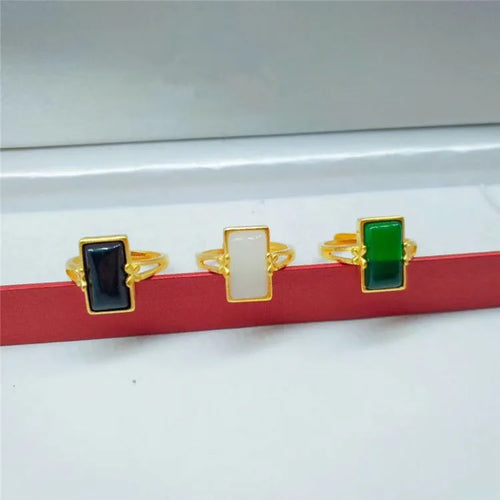 Adjustable brass gold-plated ring with artificial gemstones in black, green and white colour options