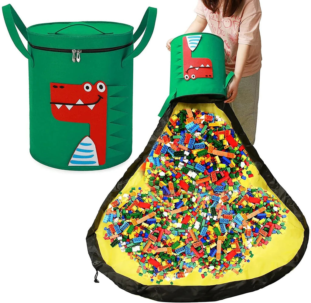 Green felt cube storage bag with a pull rope, laid flat as a play mat.