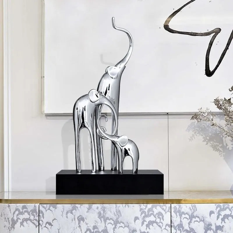 European style resin elephant decorative ornament in bright gold finish displayed on wooden surface
