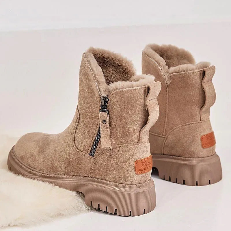 Black women's high-top snow boots with side zipper, faux suede upper, and non-slip rubber sole.