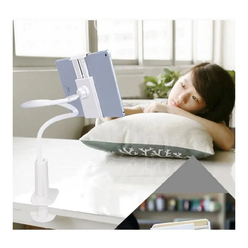 Black flexible gooseneck mount holder with suction base gripping a mobile phone