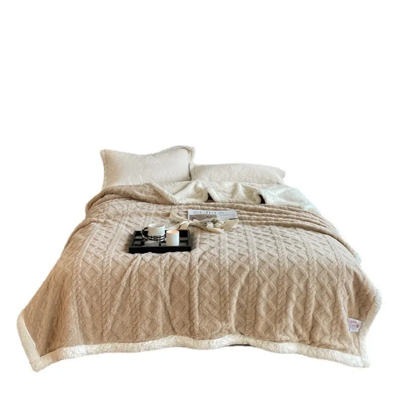 Polyester thermal flannel blanket in beige, folded to show texture and size.