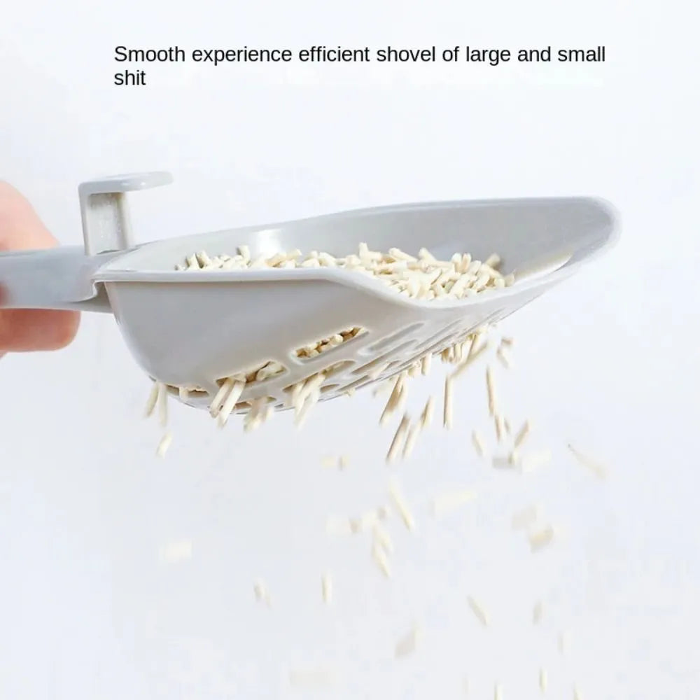 Grey plastic cat litter scoop with a detachable waste-catching base on a white background.