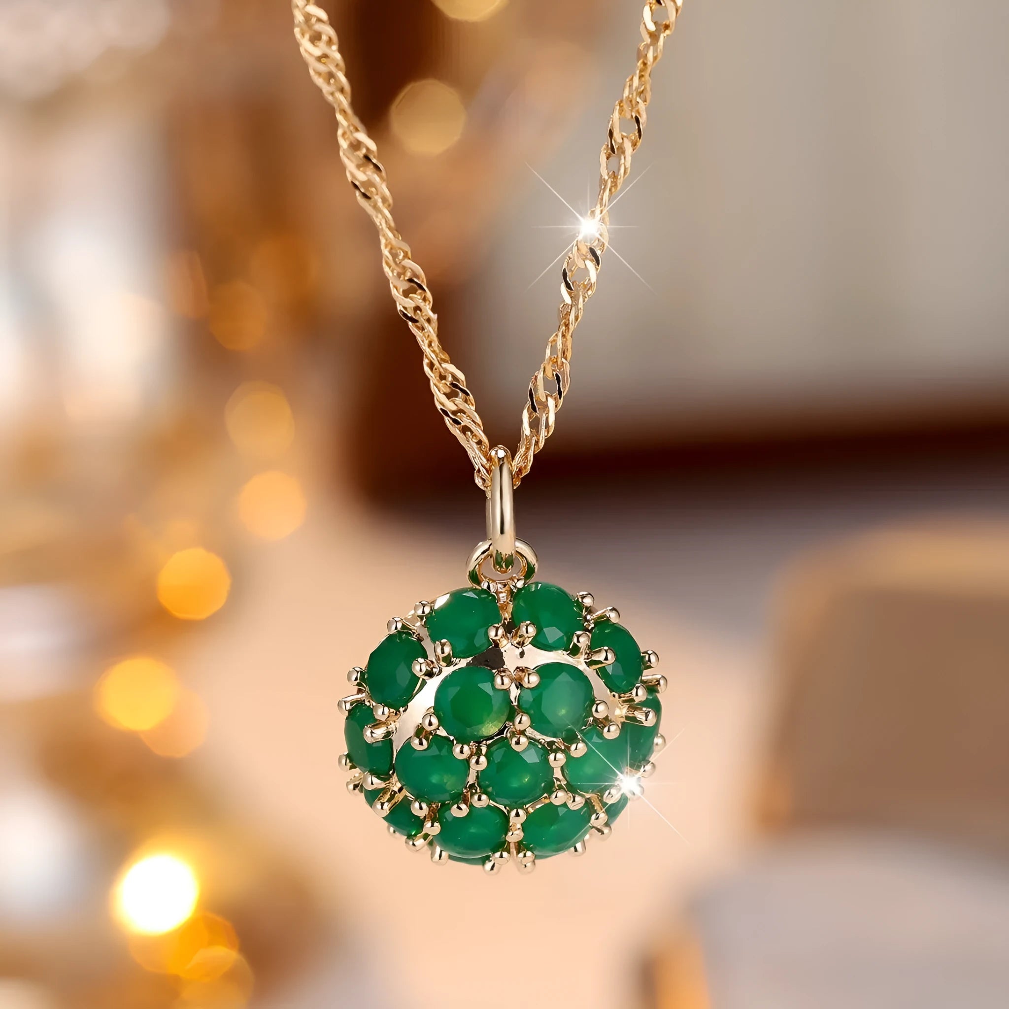 Round emerald and diamond pendant necklace in champagne gold colour on copper chain