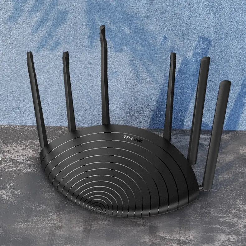 TL-WDR7661 AC1900 Gigabit wireless router with non-detachable antennas on a desk