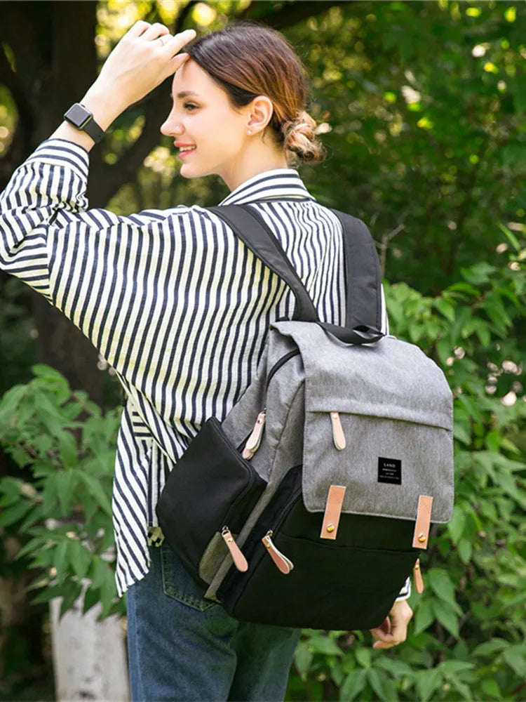 Large Oxford cloth diaper backpack with changing mat in beige colour, dimensions 33x39x15cm