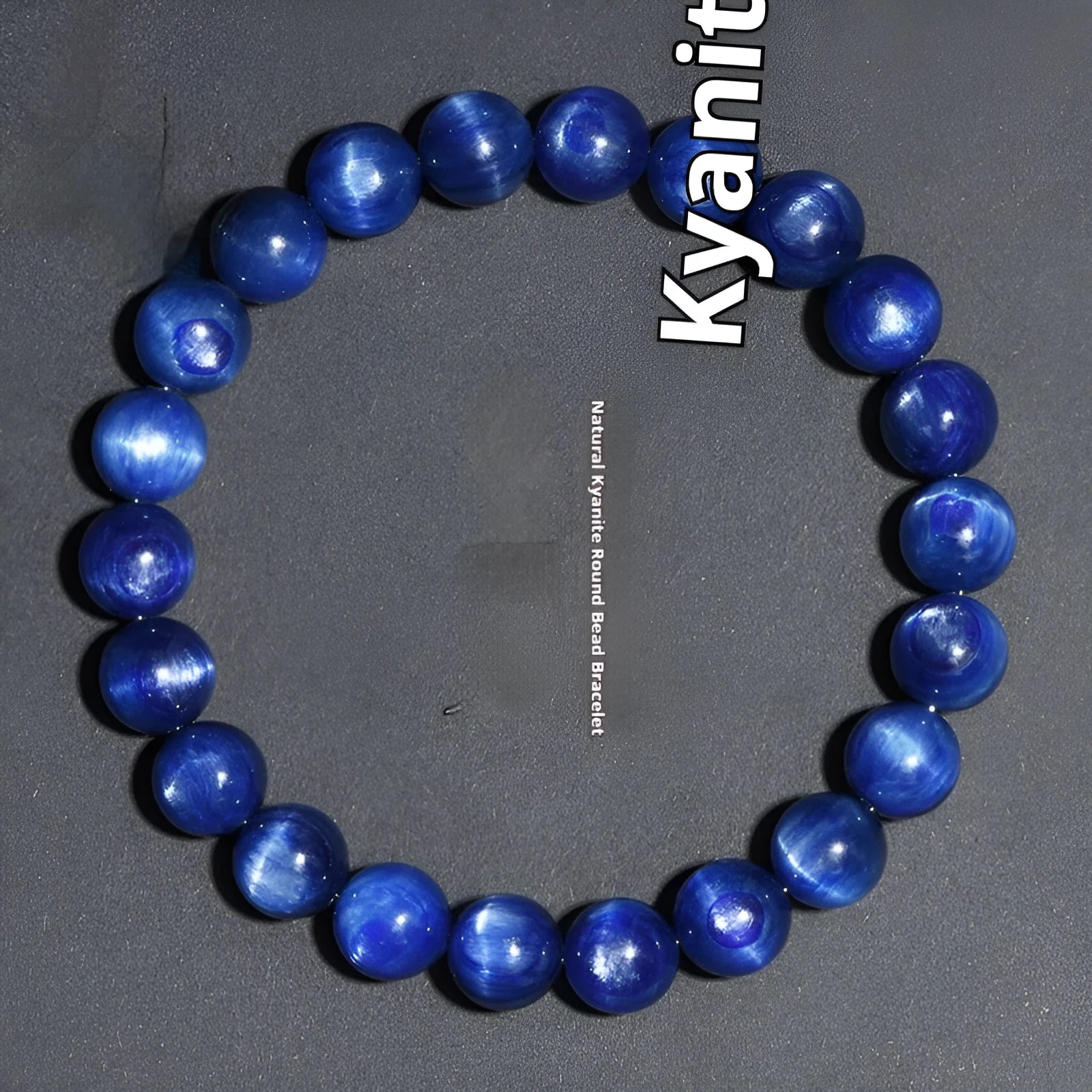 A blue crystal ball bracelet with a geometric shape and traditional Ruyi design elements.