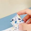 White brick-shaped rubber eraser for pencil marks with Super Clean Traceless branding