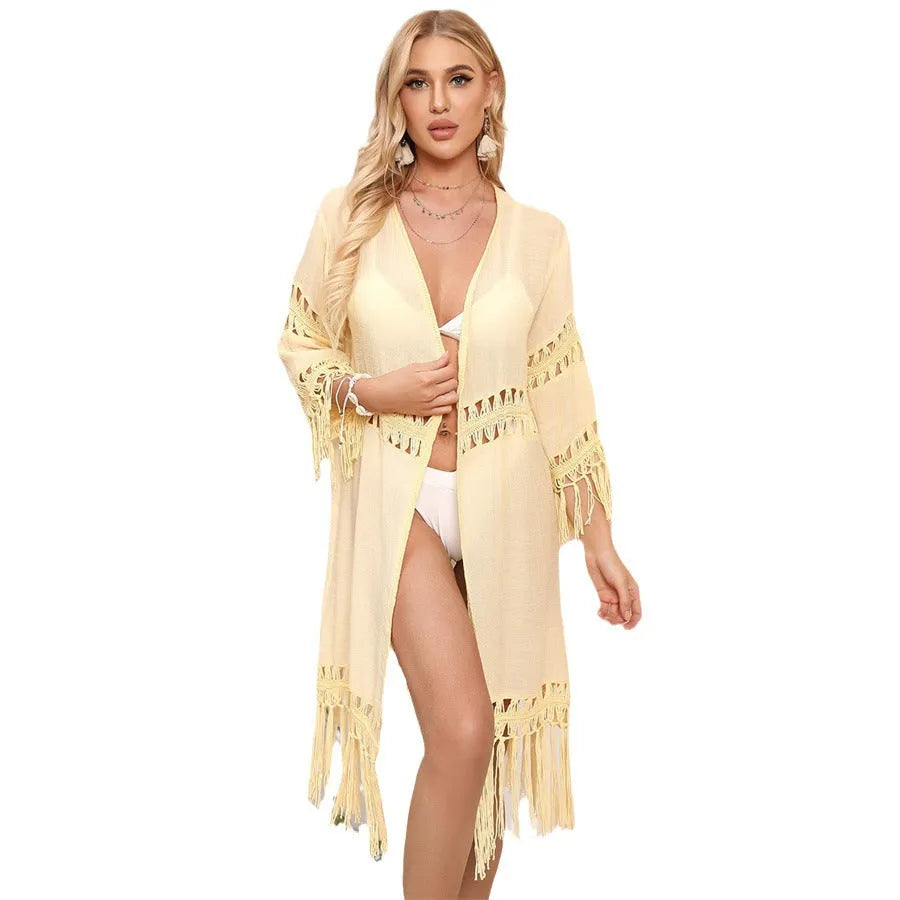 Women's hand-crocheted beach cover-up cardigan with tassel detailing in solid colour