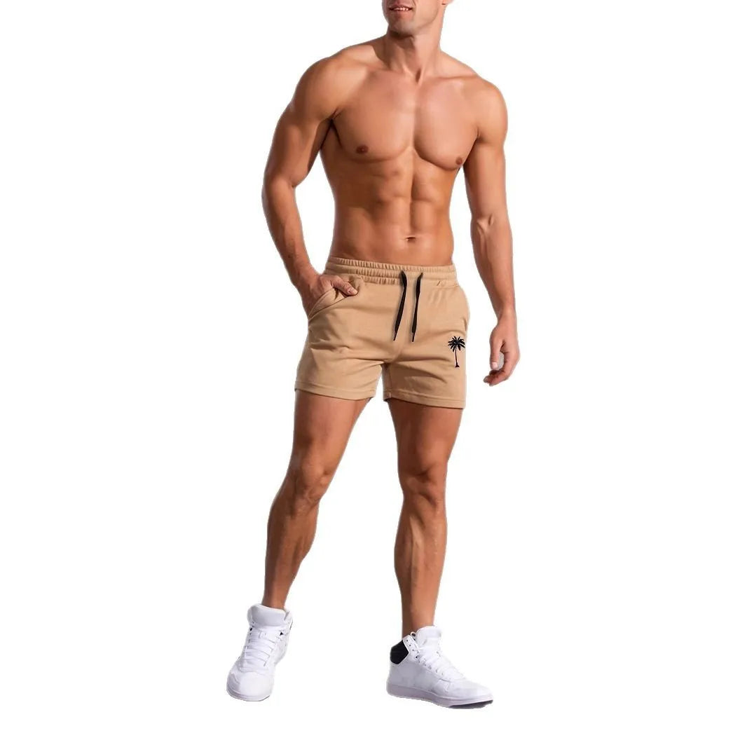 Men's khaki coconut printed sports shorts with elastic waistband and straight leg design
