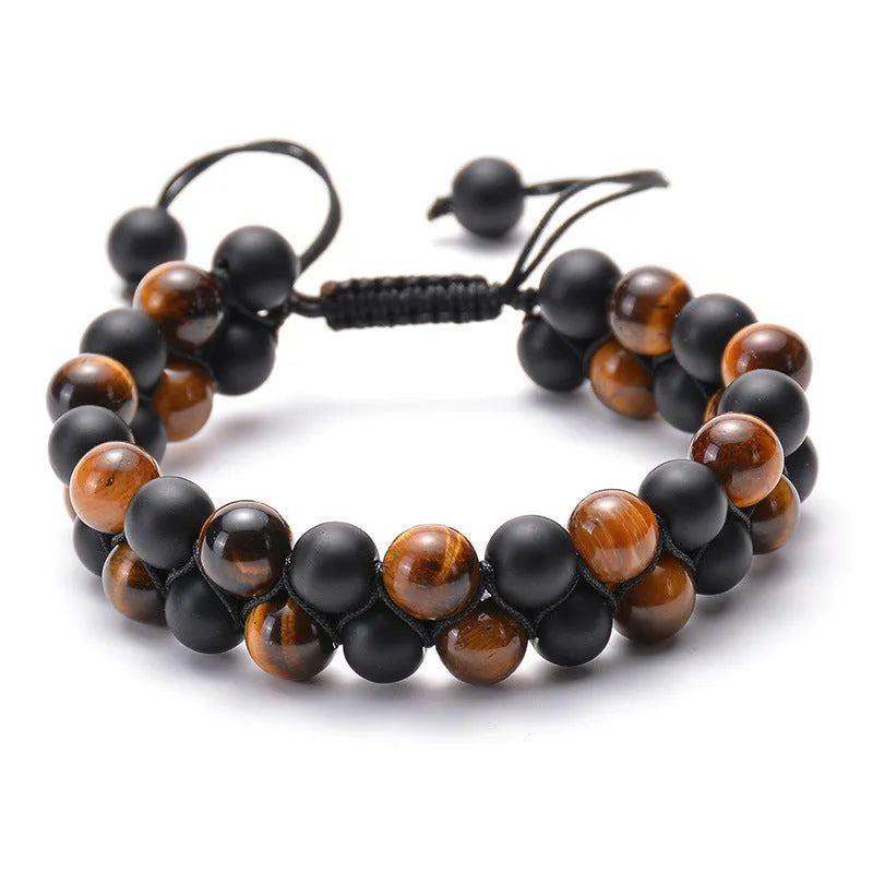 Pair of matte black agate bead bracelets with geometric design for couples.
