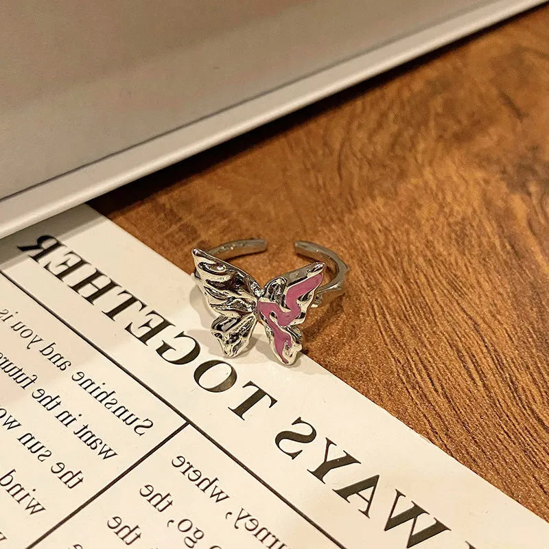 Butterfly design copper ring with oil-drip textured finish in women's jewellery