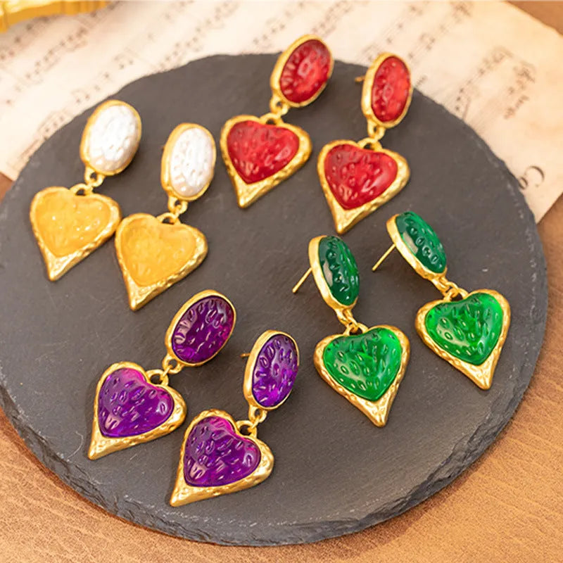 Oval love heart stud earrings with silver needle pleated finish in four colour options