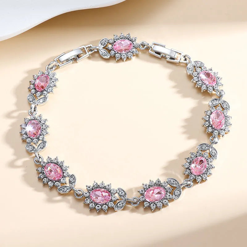 Women's bracelet with inlaid zircon gemstones in multiple colours on environmentally friendly alloy band