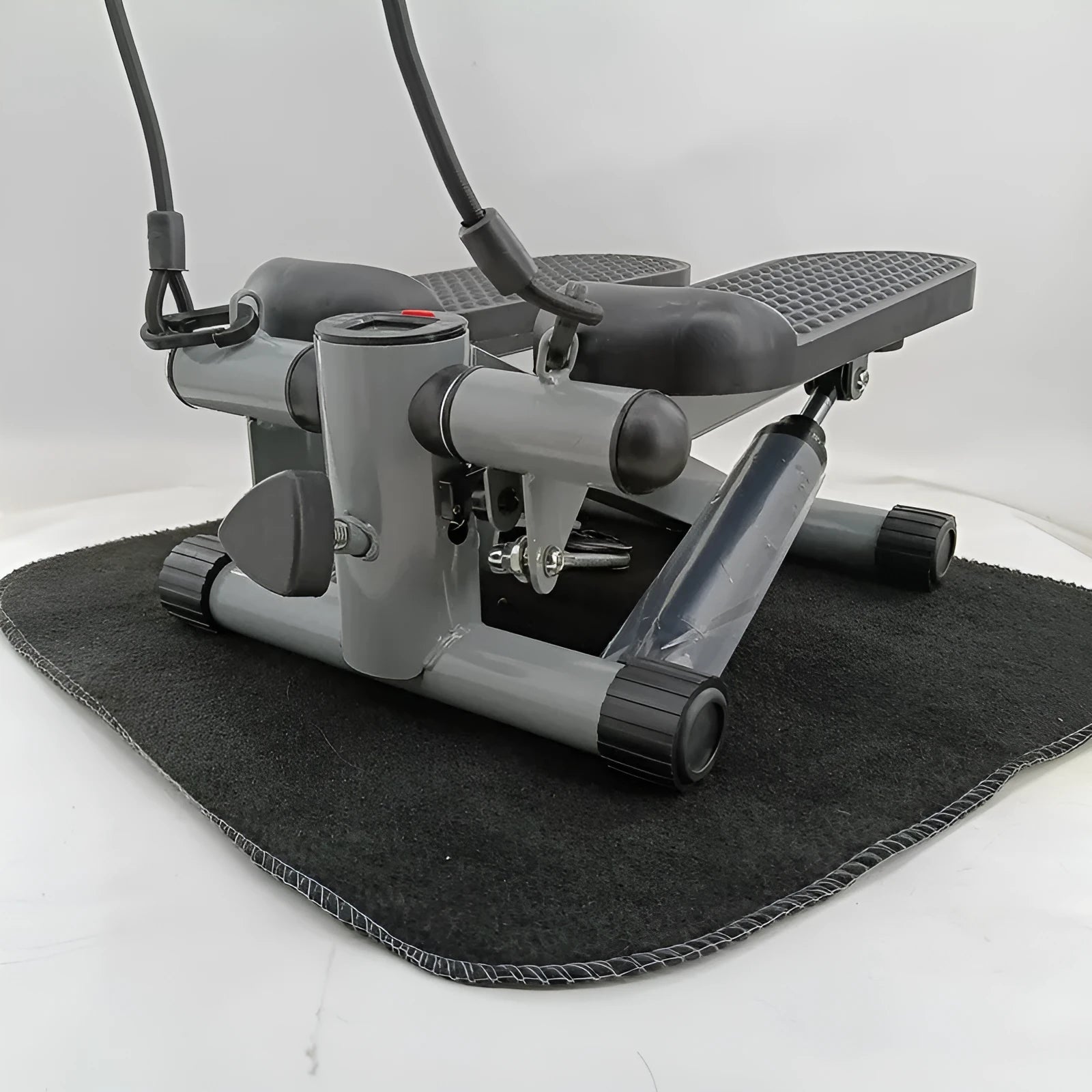 Silver grey hydraulic resistance mini treadmill exercise machine with pedal configuration