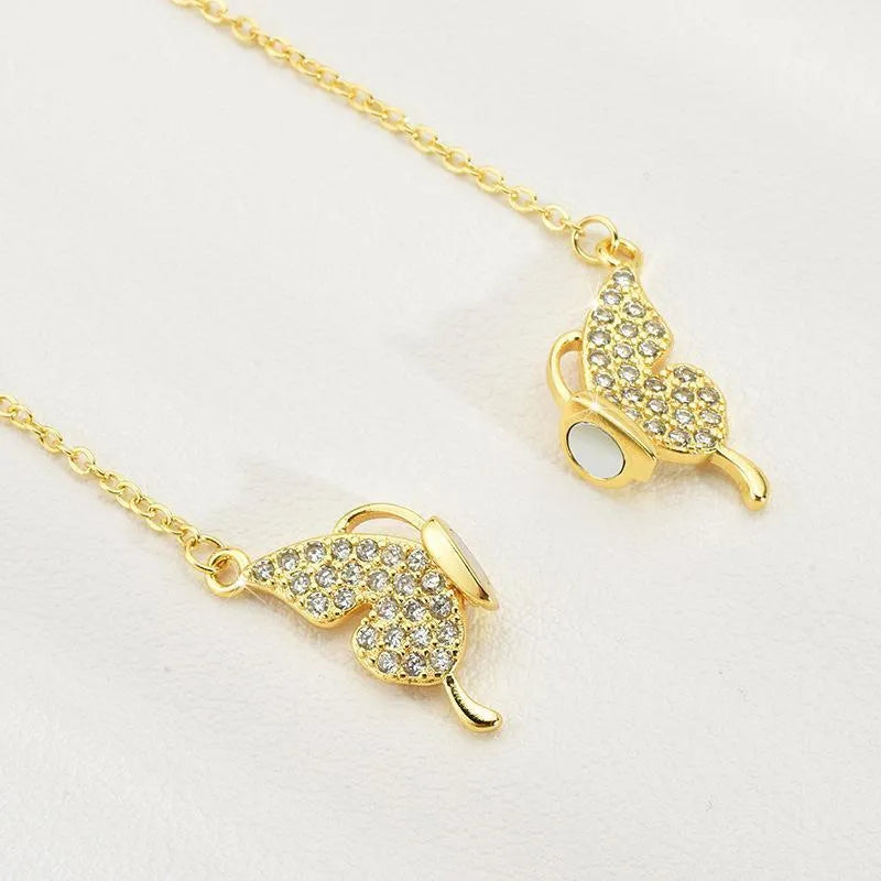 Women's titanium steel twisted chain necklace with magnetic butterfly pendant in gold or silver