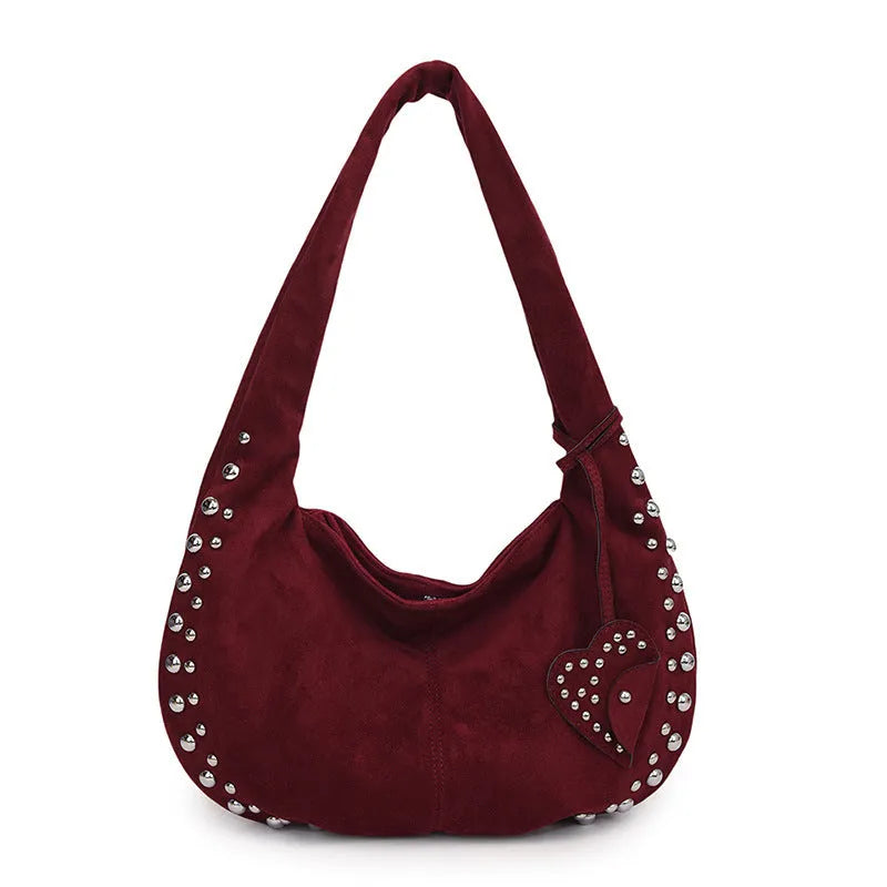 Women's soft plush tote handbag in retro styling with strapless underarm design