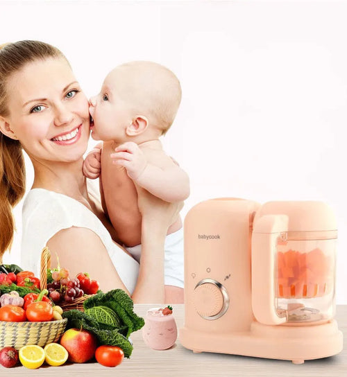 Baby food processor with steamer and blender functions in green or pink colour options