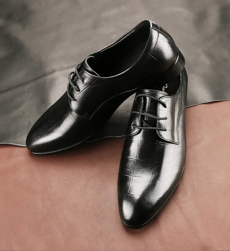 Men's black leather derby shoes with pointed toe and sewing details on antiskid rubber sole