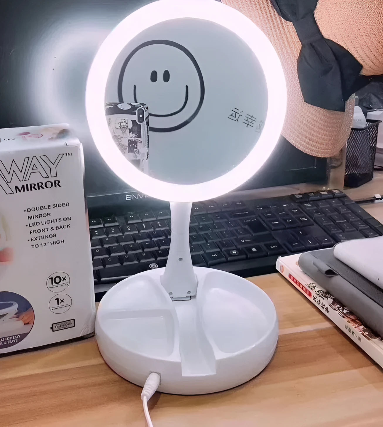 White acrylic frame LED vanity mirror with USB charging and foldable design