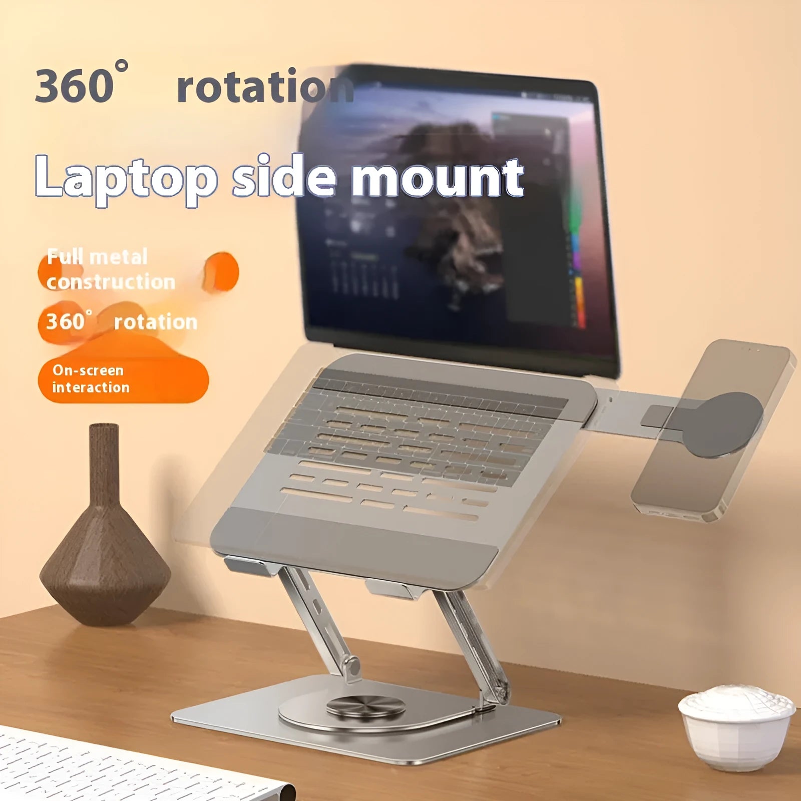 Silver carbon steel laptop stand with side-mounted magnetic phone holder rotated for viewing