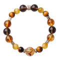 Lucky Jinba tiger-eye crystal bracelet showing geometric yellow beads in natural stone