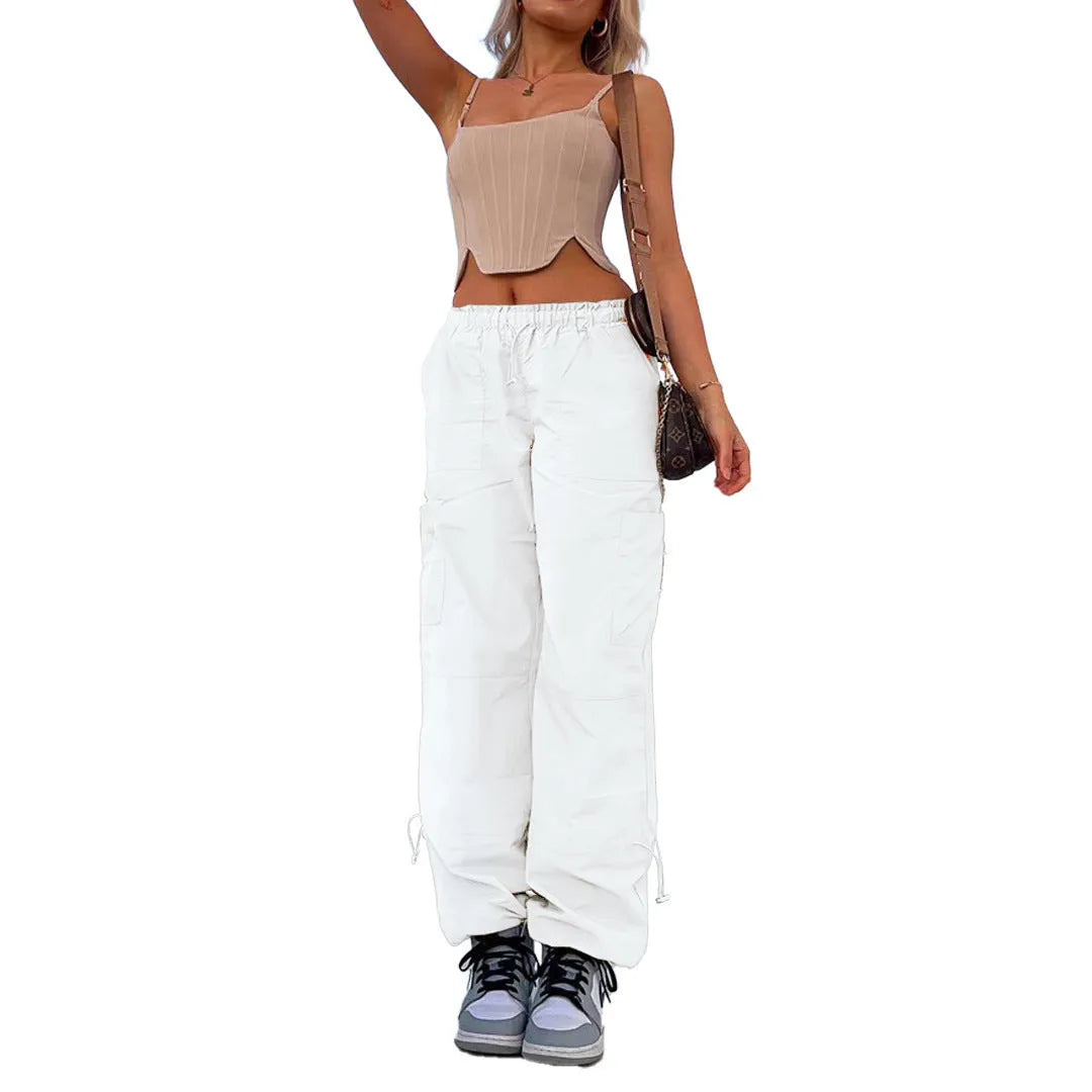 Straight-leg loose fit cargo casual pants in grey with multiple pockets, made from polyester fabric.
