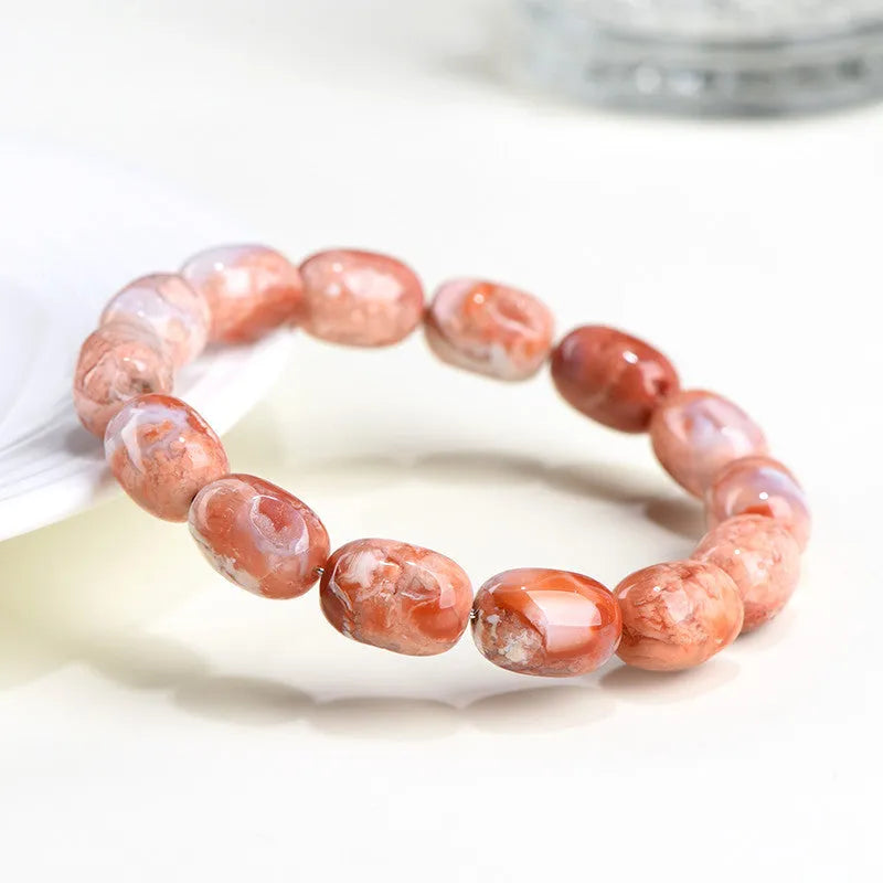 Natural cherry agate barrel bead bracelet with geometric 10x14mm beads and Ruyi charm