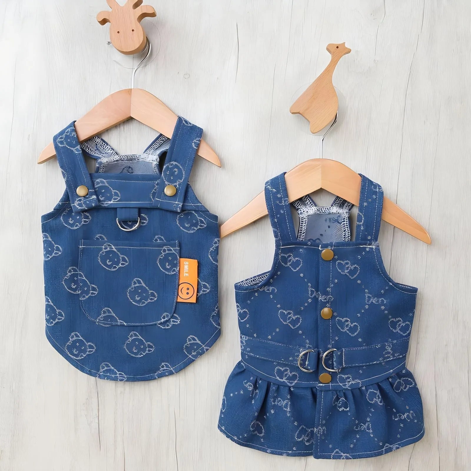 Small dog wearing denim princess dress with bracket skirt styling in blue denim fabric