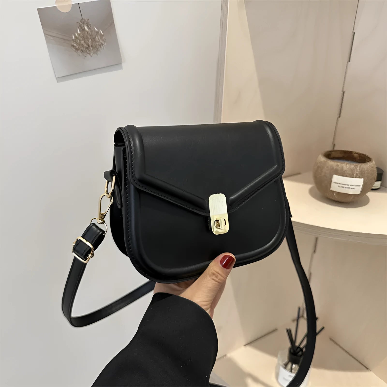 Soft textured PU leather messenger bag with clamshell opening, shown in a horizontal square shape.