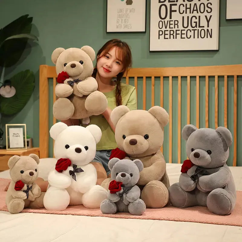 Soft plush Rose Bear teddy bear toy in beige, brown or grey, shown in sizes from 23cm to 45cm.
