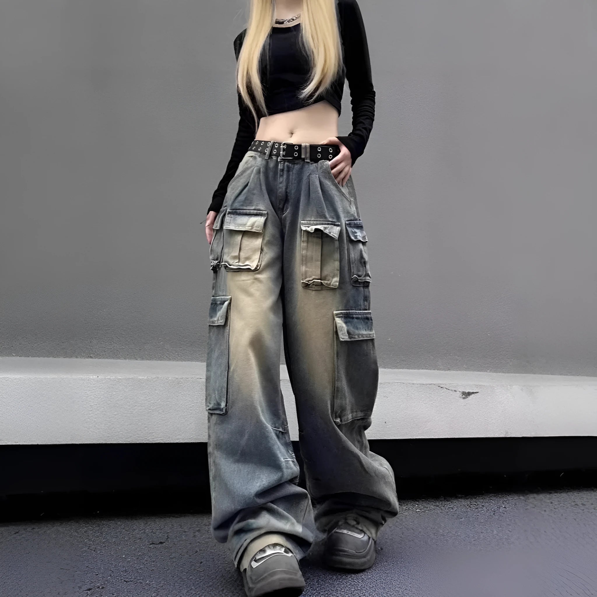 Loose fit denim pants with multiple pockets in washed distressed light blue finish