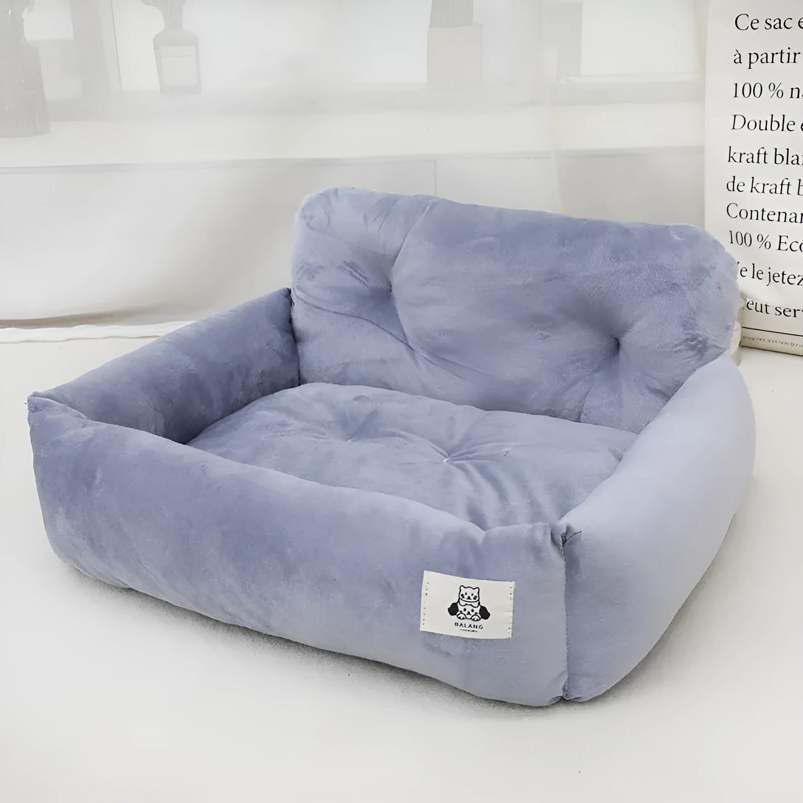 Grey and blue plaid car-mounted pet travel nest for dogs with stain-resistant cloth material