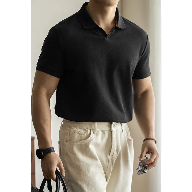 Blue cotton polyester blend short-sleeved polo shirt on a hanger, showing regular fit and casual style.